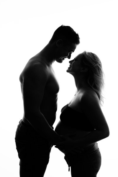 Silhouette of an Expectant Couple in Love
