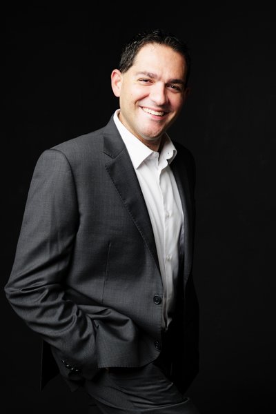 Confident Headshot in Grey Suit with Natural Smile