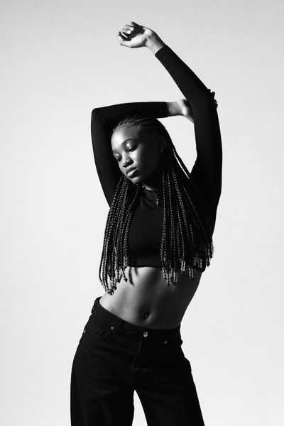Monochrome Fashion Portrait with Raised Arms