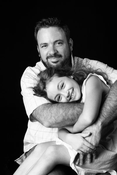 Father Hugging Daughter Portrait