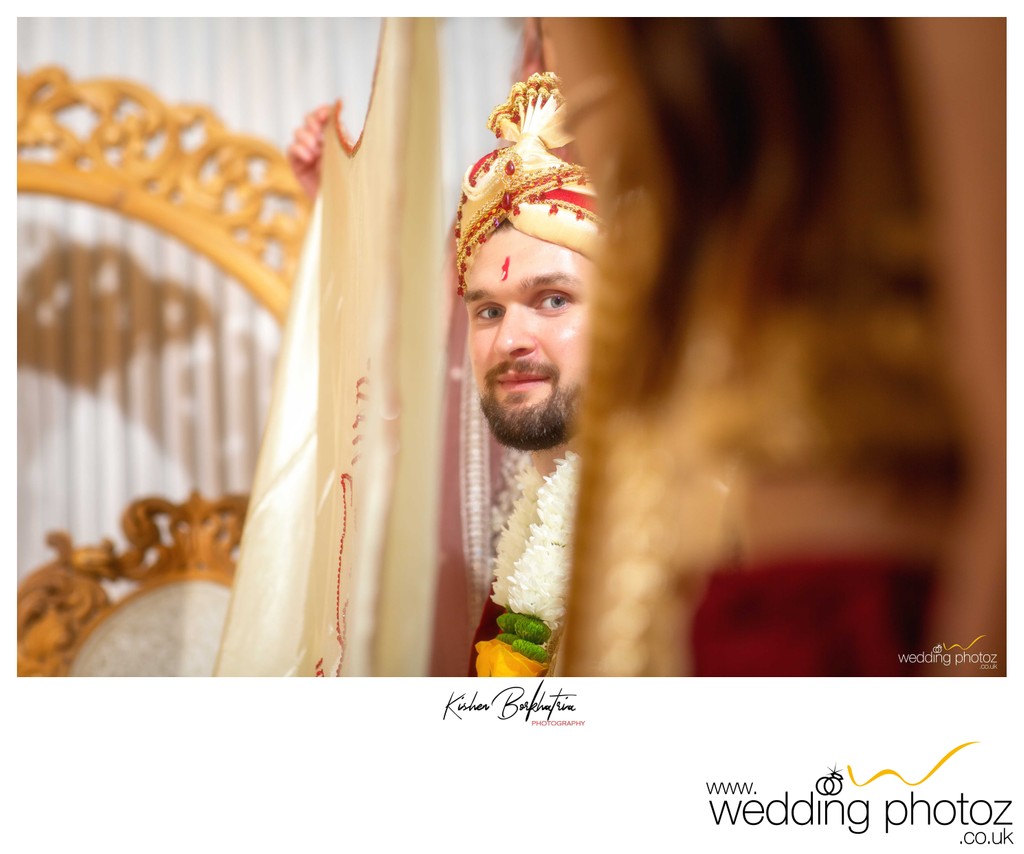 Groom photographed awaiting at Hindu wedding