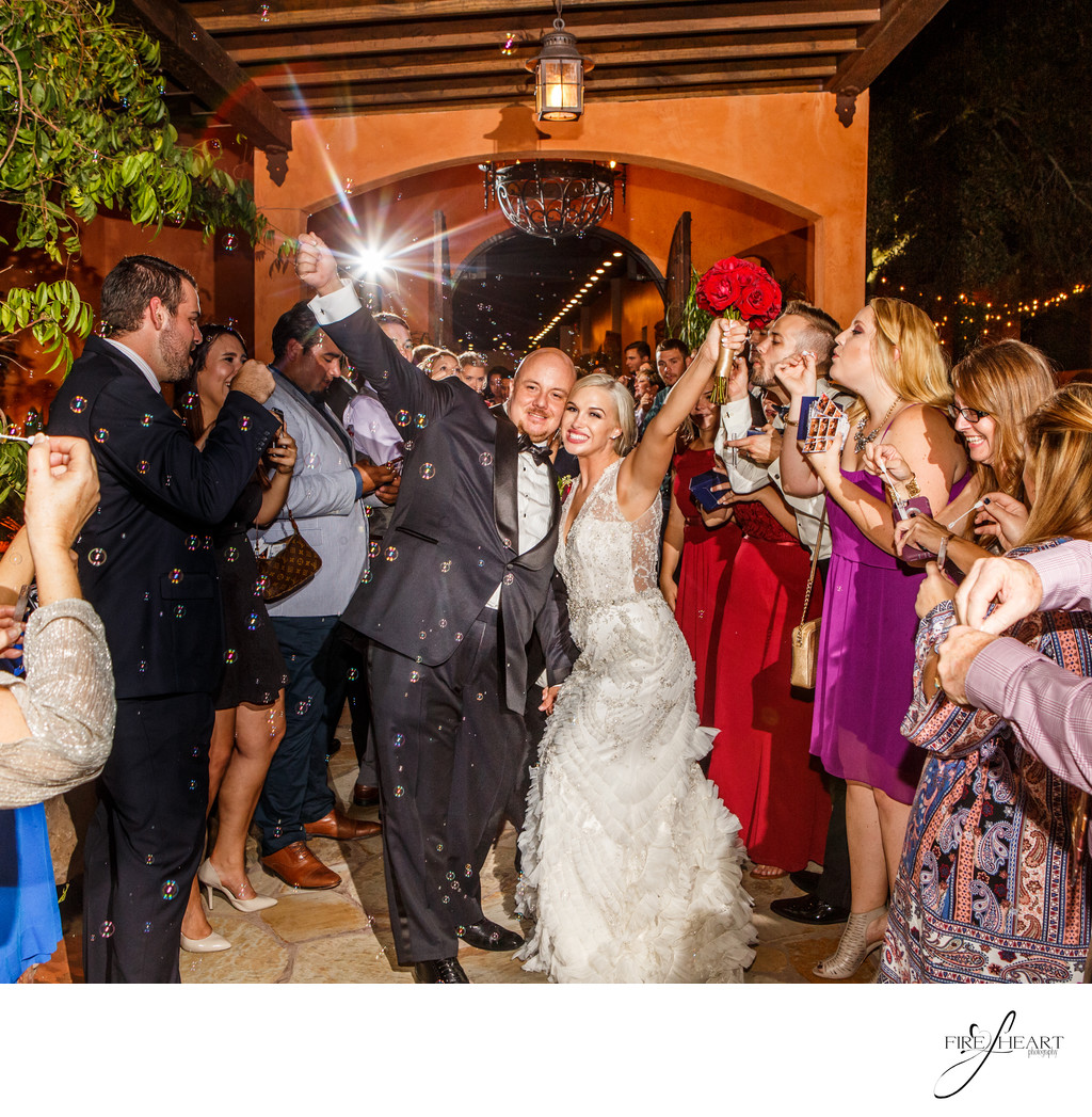 Houston wedding Photographer grand exits with bubbles