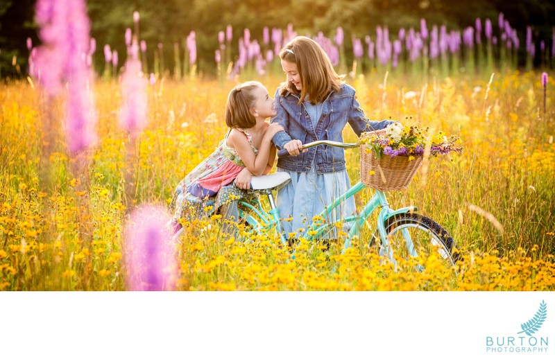 Two sisters, bicycle, wildflower field, Blue Ridge NC