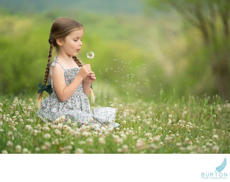 Young girl with dandelion, children’s portrait, Boone