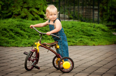 Blowing Rock Portrait of Boy with Tricycle
