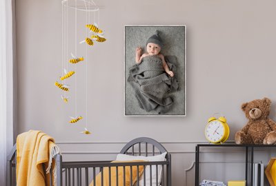 stylish grey and yellow baby bedroom with crib and industrial black metal shelf