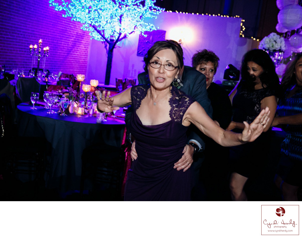 Fun dancing photo in wedding reception