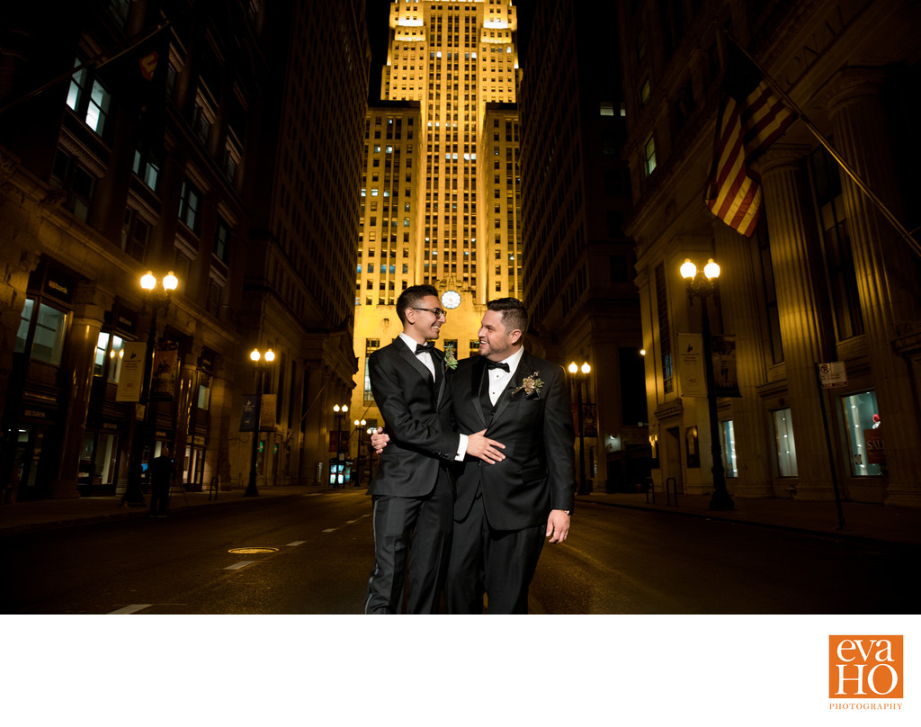 Gay Couple in Front of Chicago Board of Trade at Night