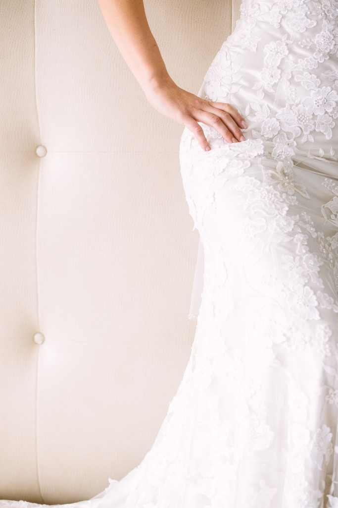 Bridal Curves And Gown Details At The Belamar Hotel In Manhattan