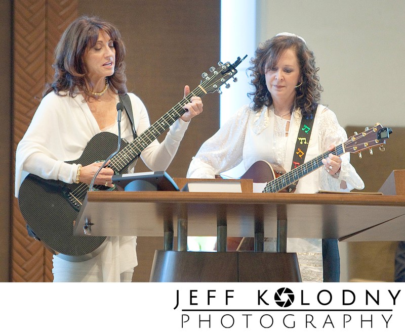 Mom playing Guitar at her son's Mitzvah