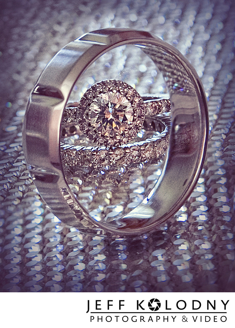 Wedding ring through a wedding ring photo.