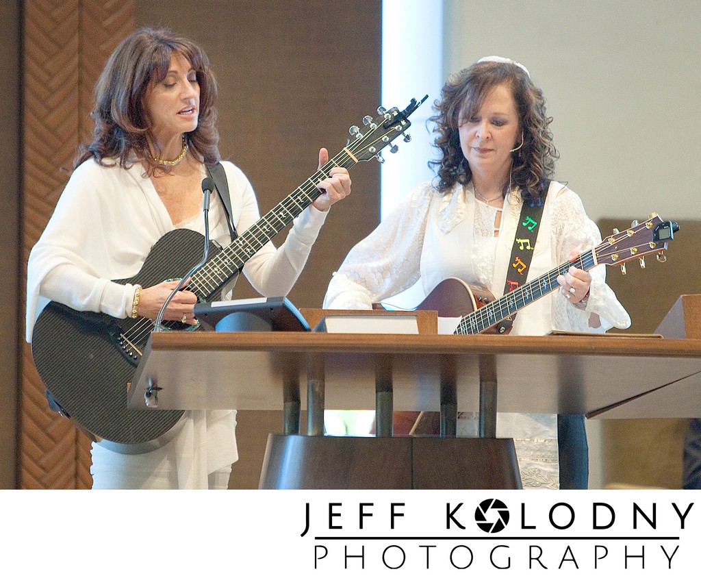 Mom playing Guitar at her son's Mitzvah