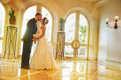 Bride and groom kiss at the Four Seasons