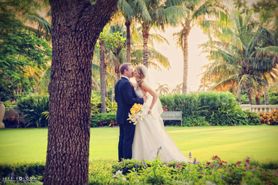 Bride and groom Kiss at The Breakers