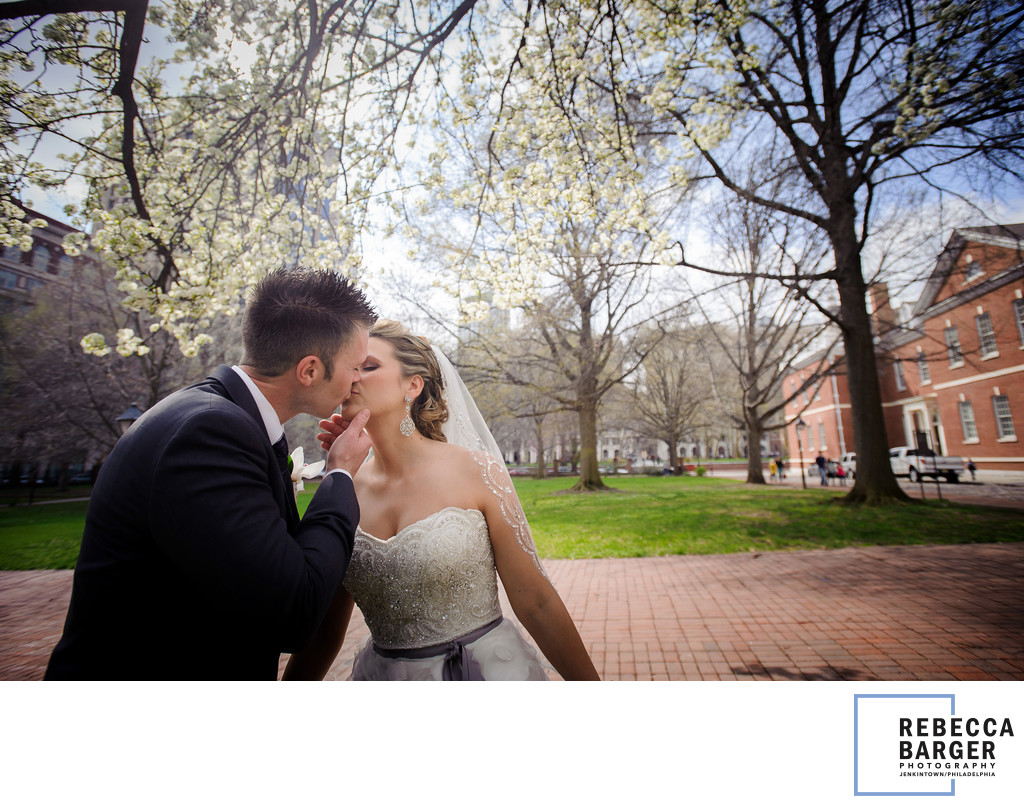 Springtime kiss in Philadelphia's Finley Catering's Union Trust. 