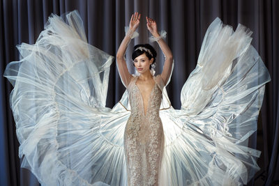Mei and her angel wings Eden Aharon gown at  Moulin 