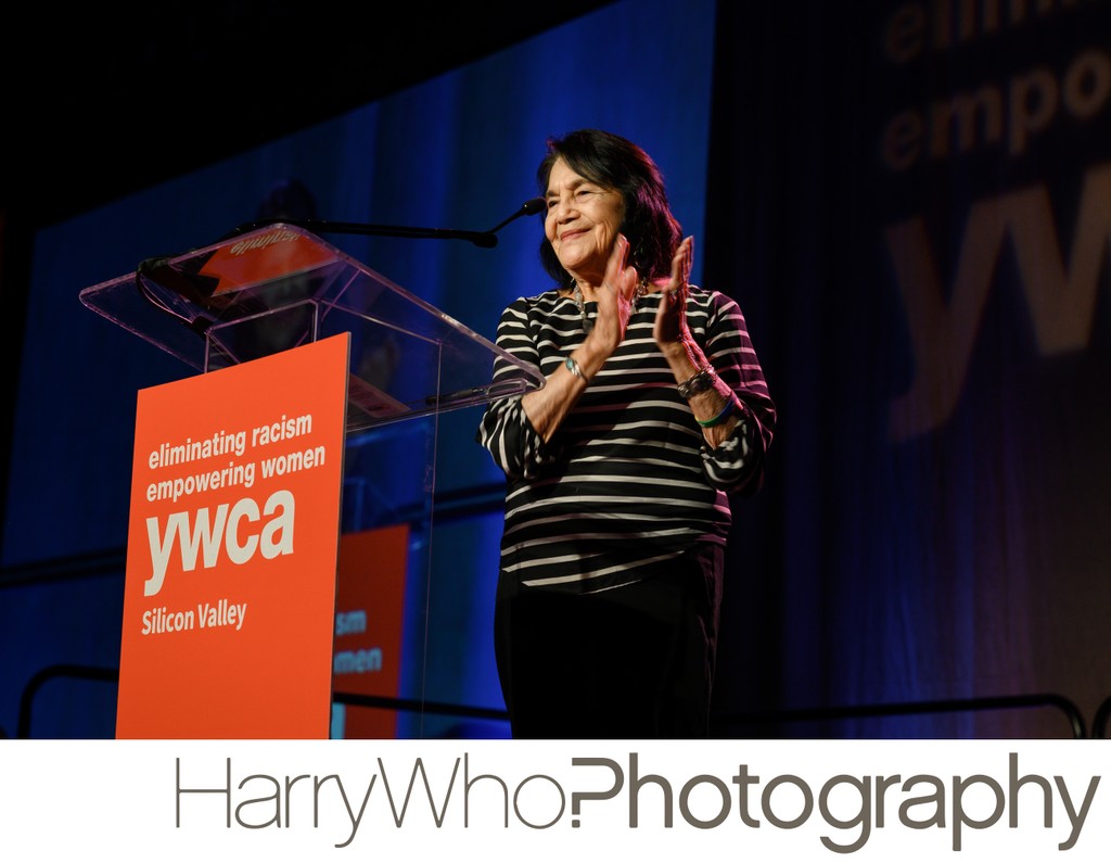 Activist Dolores Huerta speaking on the stage