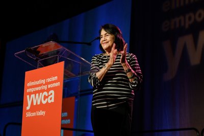 Activist Dolores Huerta speaking on the stage