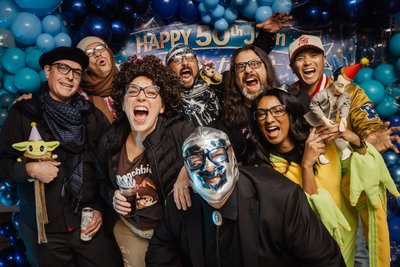 Fun Photo of a Birthday Party goers wearing fun costume