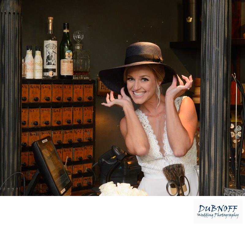 Cute picture of Bride posing with a hat on from North Beach in San Francisco