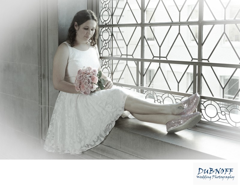 Pretty Bride sitting in San Francisco city hall window