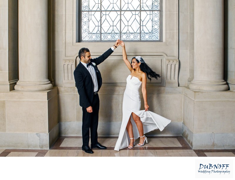 Groom twirling bride - City Hall Wedding Photogaphy