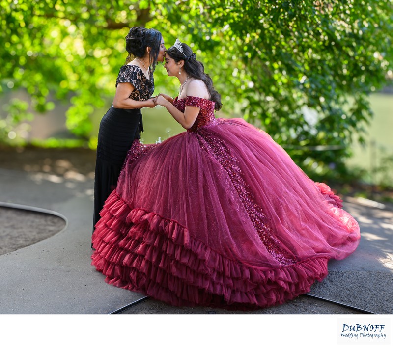 Mother and Daughter share a moment during Quince photography session