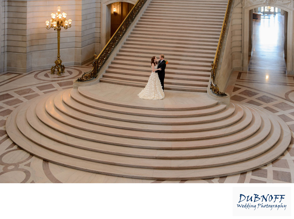 grand staircase sf city hall with Bride and Groom