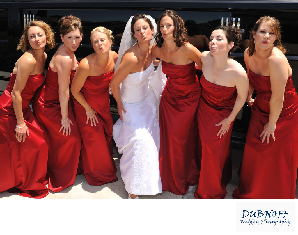 Walnut Creek Bride Posing with her Attendants in Red Dresses