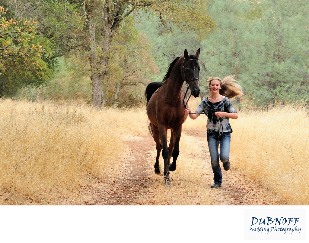 Girl Running with her horse during Equine Portrait Session