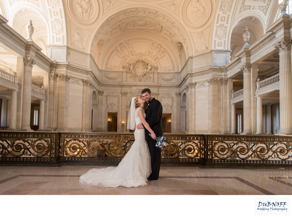 San Francisco Mayor's Balcony kiss on the cheek after wedding