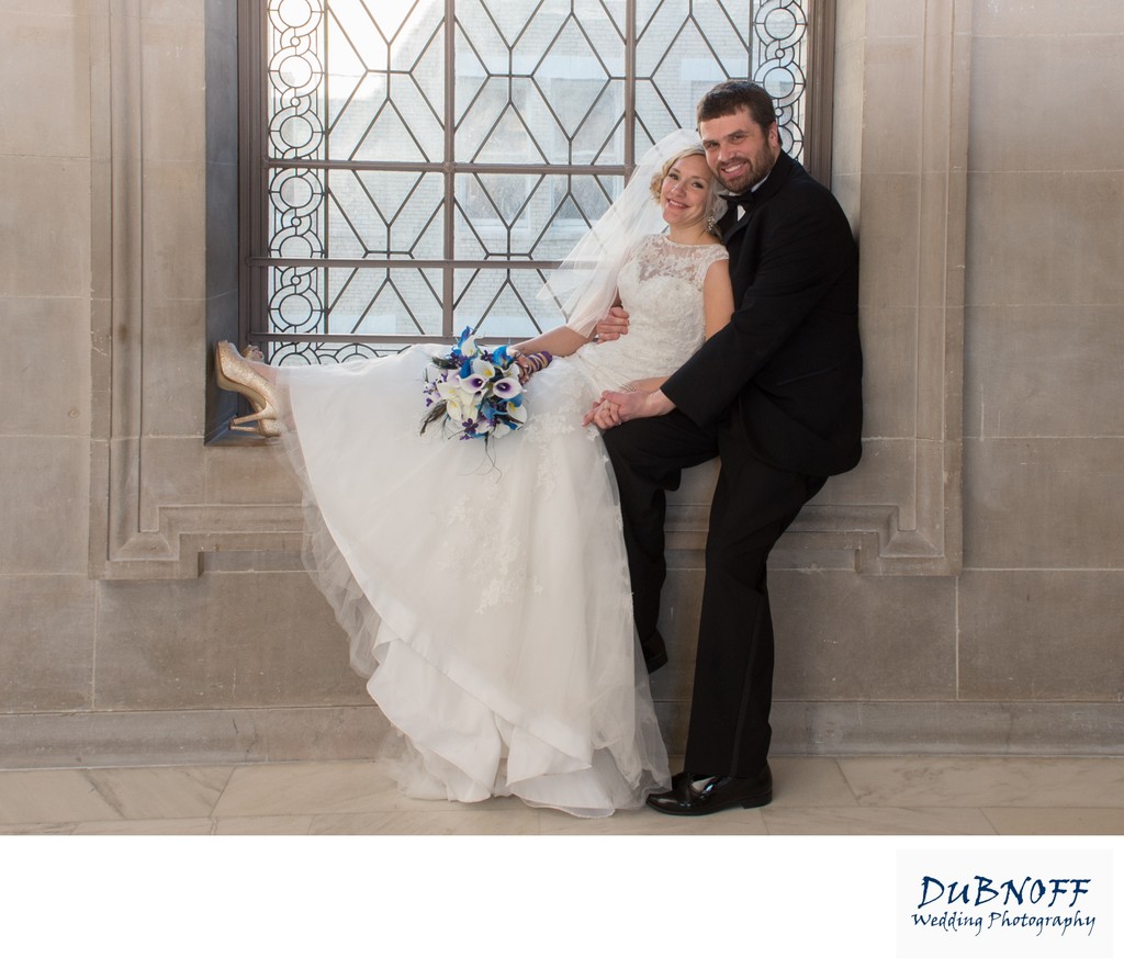 City Hall Window wedding image of bride and groom