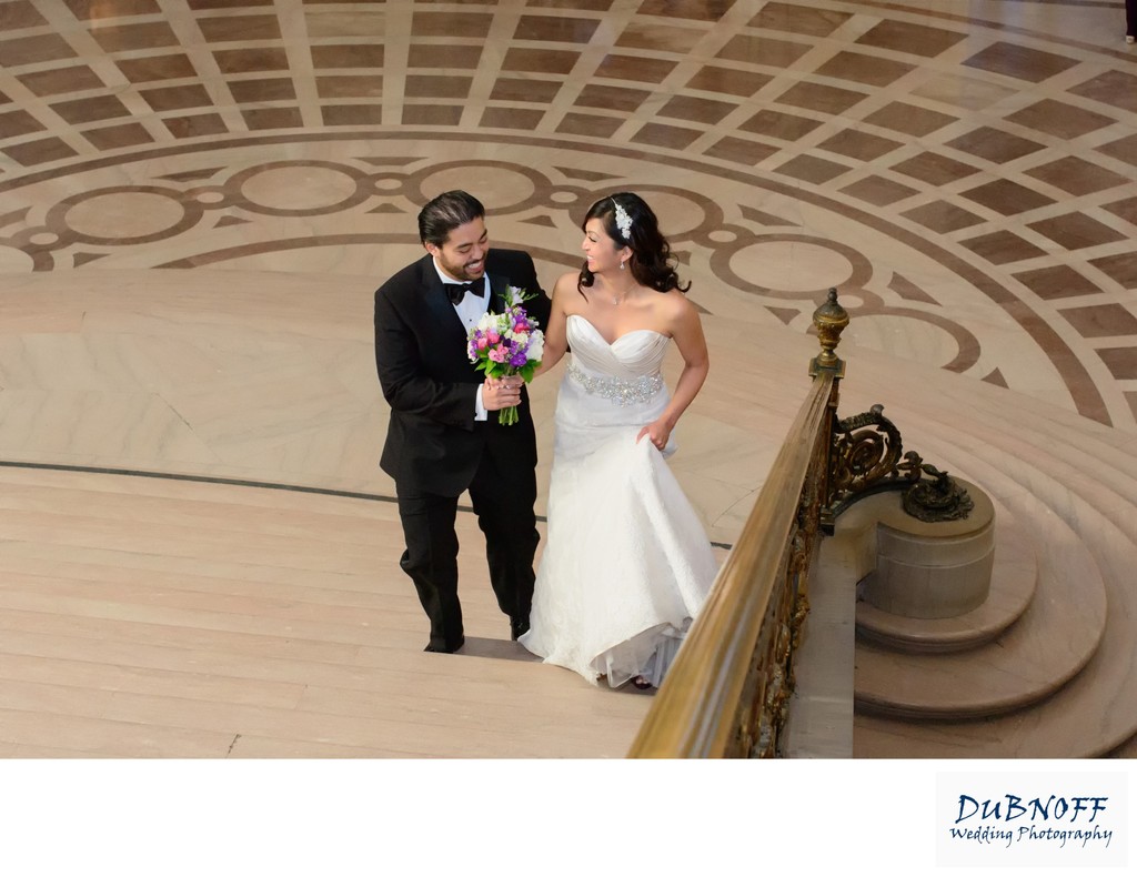 SF City Hall Newlyweds walking up the Grand Staircase