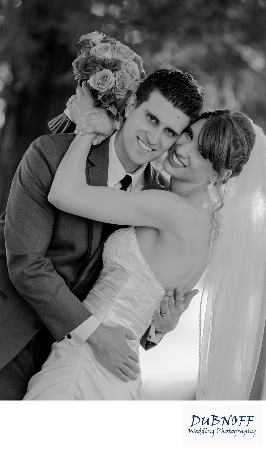 bride and groom bouquet black and white wedding photo