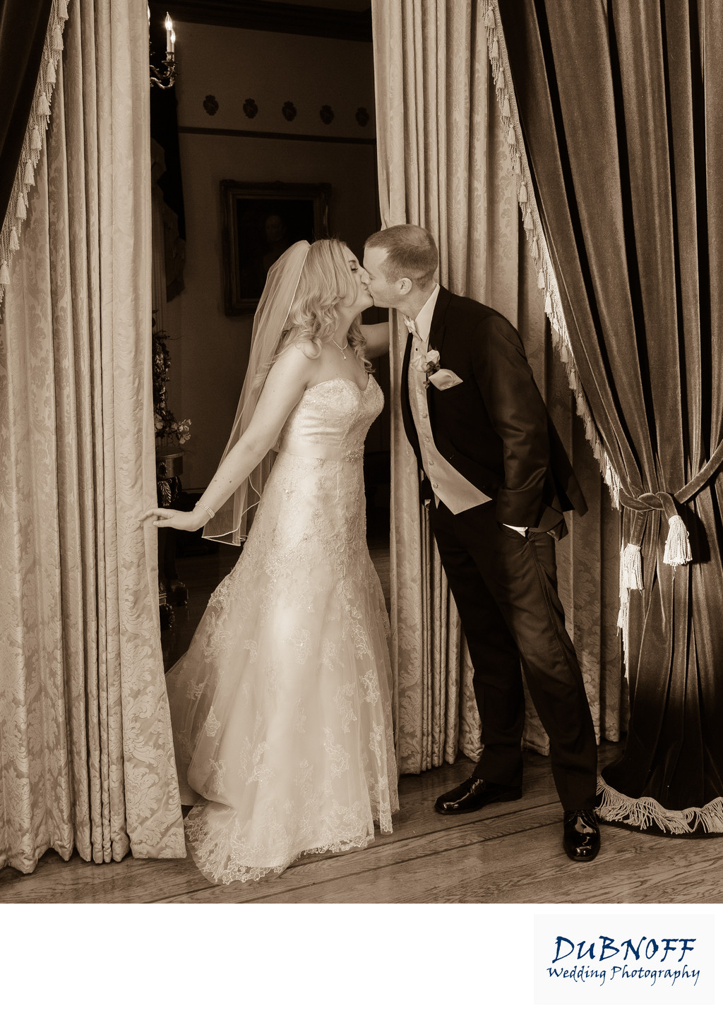 first look wedding kiss in Sepia Tone Photography