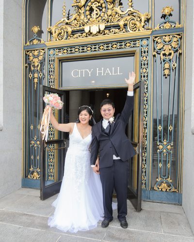 Newlyweds Celebrating as they Leave San Francisco City Hall