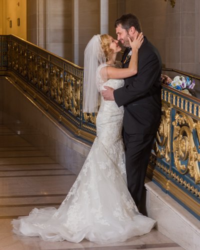 Bride and groom ready to kiss, SF City Hall wedding photography