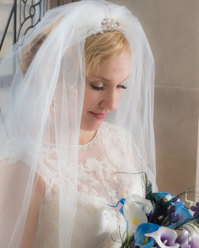 Veil framing brides face for wedding photography