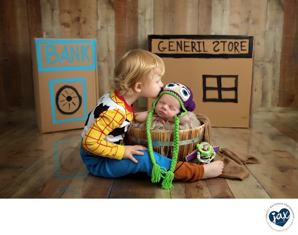 Newborn and sibling Toy Story Themed photo shoot
