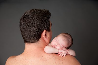 Baby on daddy's shoulder, skin on skin, classic