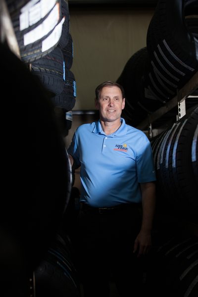 Portrait of a manager on location at Sun Tire