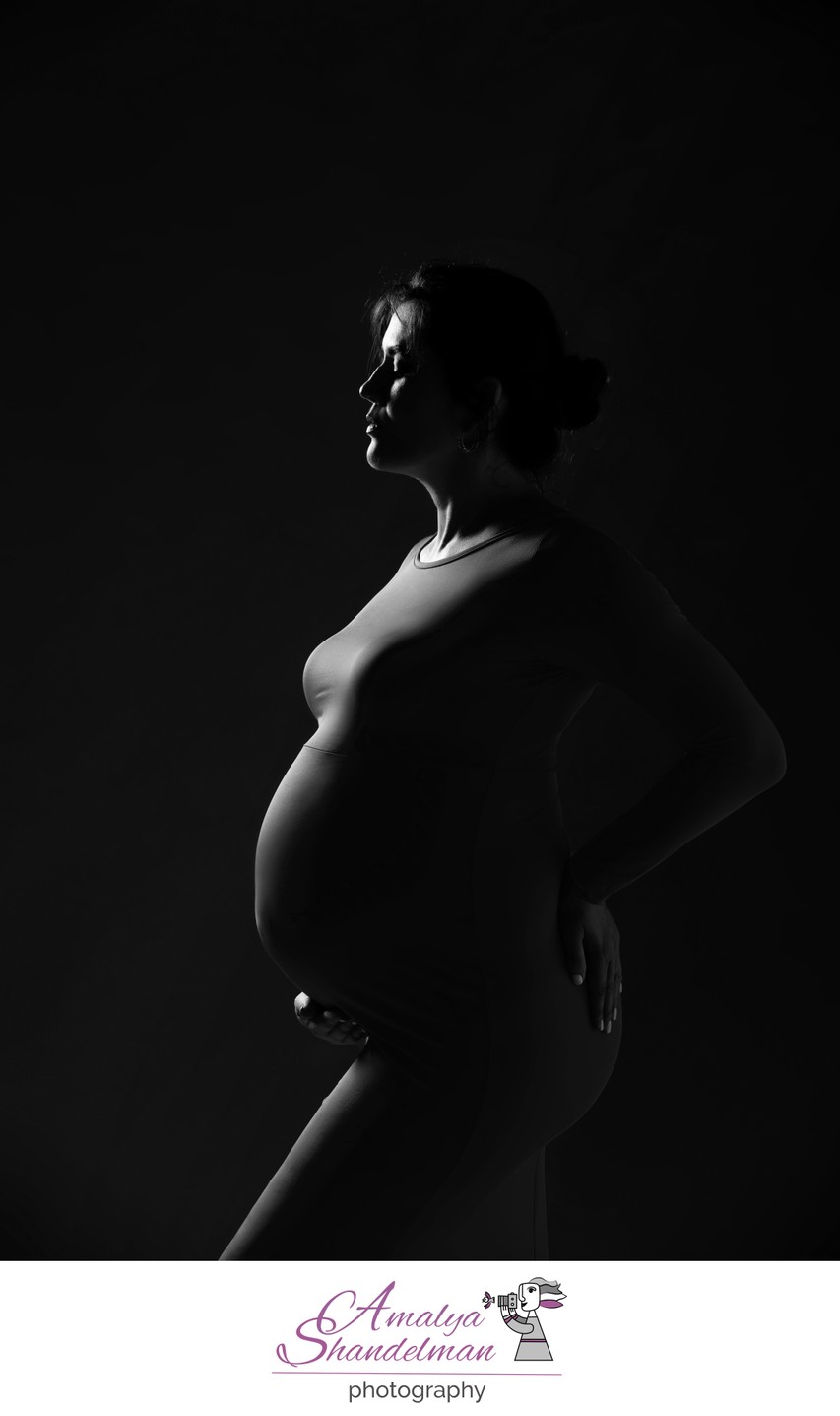 Silhouette Maternity Portrait of Woman Expecting Baby