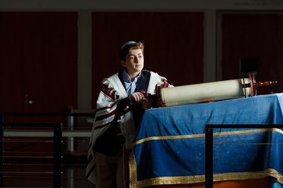 Portrait of a Boy with Torah in a Synagogue