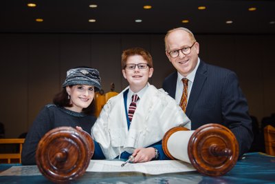 Family Portrait at Bar Mitzvah in Synagogue