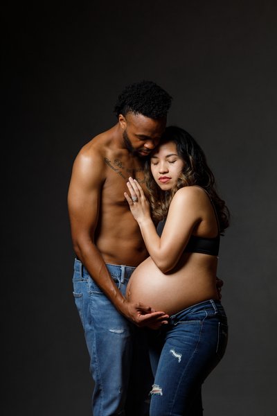 Touching Maternity Portrait of Parents-to-be