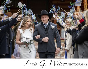 Off the Wall: Cowboy groom kisses his bride before the mass wedding in the  Stockyards