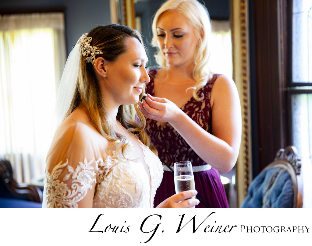 Sisters getting ready at Christmas House and Garden Wedding