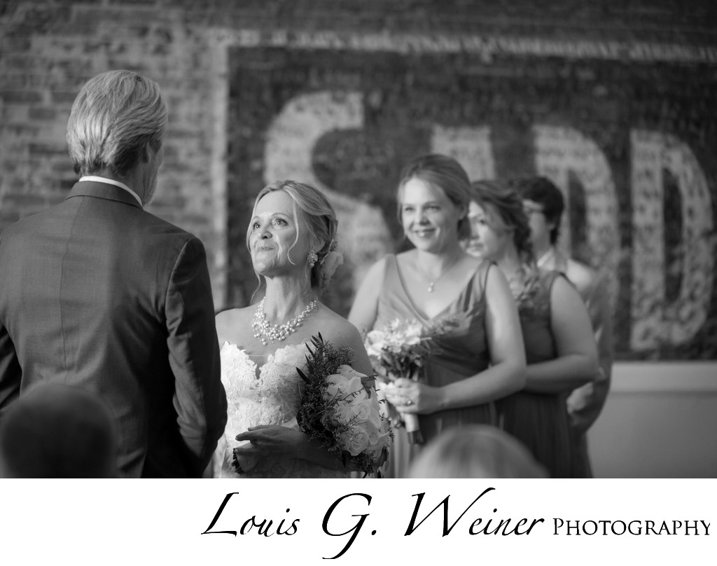 The way she looks at him.  Wedding ceremony photograph.
