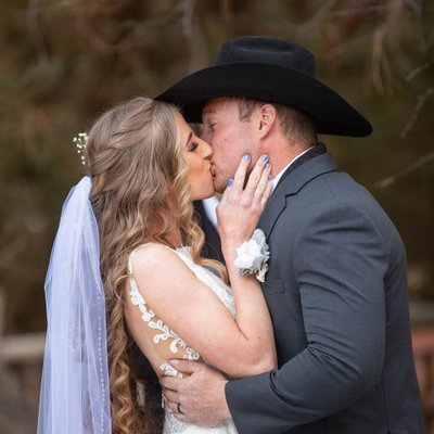 First Kiss at Cowboy wedding, Gold Mountain Manor, CA