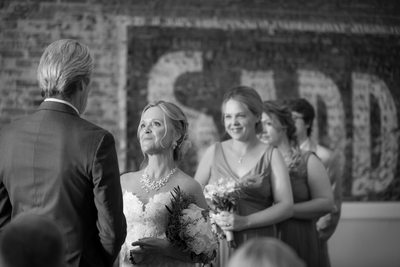 The way she looks at him.  Wedding ceremony photograph.